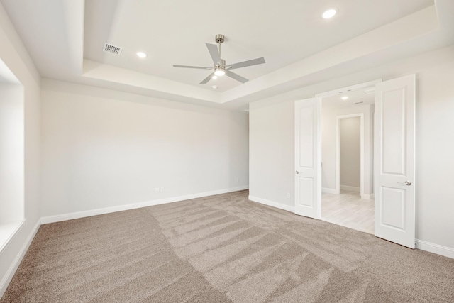 329 Sparkling Springs Dr, Waxahachie, TX 75165 - unfurnished bedroom featuring a tray ceiling, carpet floors, recessed lighting, baseboards, and ceiling fan