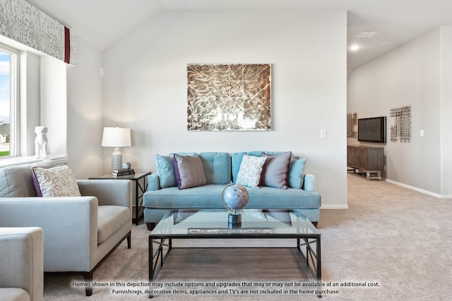 carpeted living room with lofted ceiling