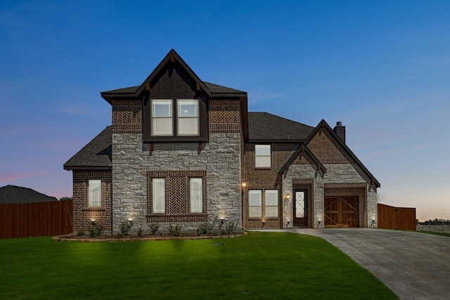 329 Sparkling Springs Dr, Waxahachie, TX 75165 - view of front of home with stone siding, concrete driveway, a garage, and a chimney