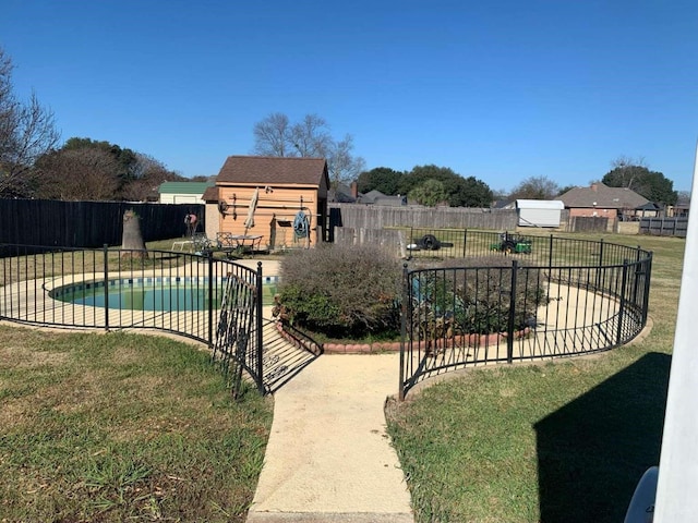 view of swimming pool featuring a yard and a patio