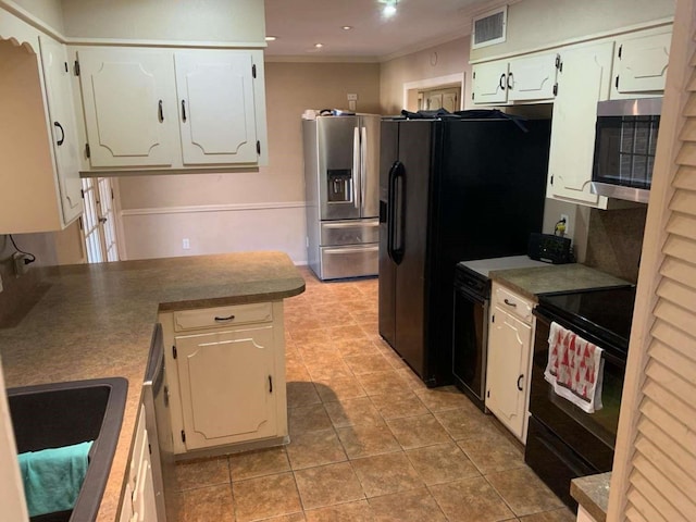 kitchen featuring sink, white cabinets, crown molding, light tile patterned flooring, and black appliances