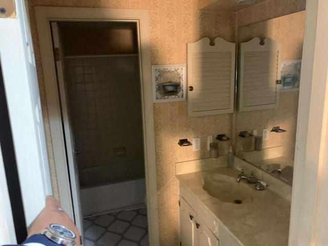 bathroom featuring vanity and a bathing tub