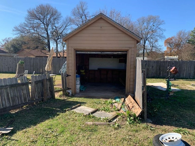 garage featuring a yard