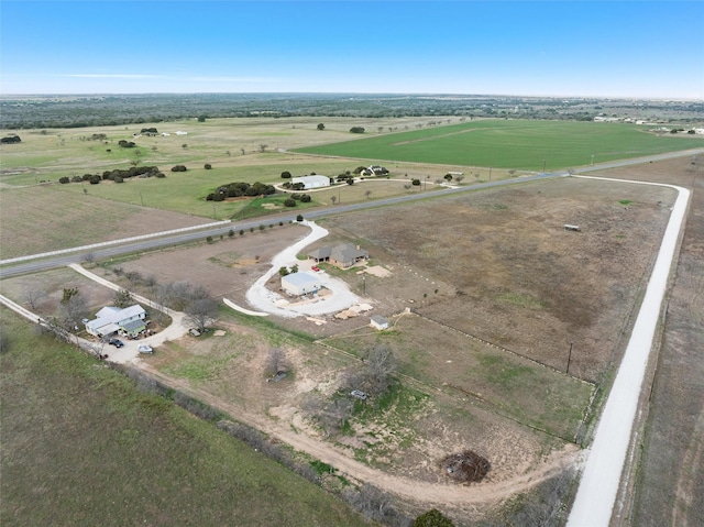 birds eye view of property featuring a rural view