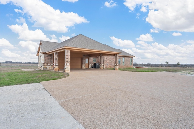 exterior space featuring a carport