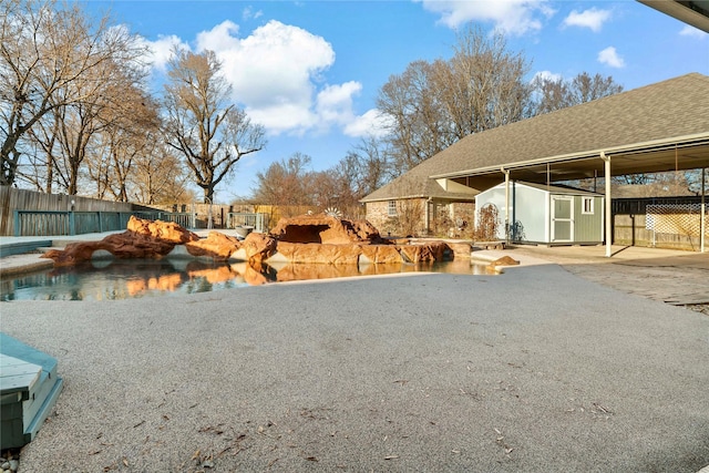 view of yard with a patio area and a shed