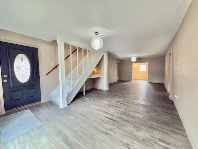 entrance foyer with hardwood / wood-style flooring