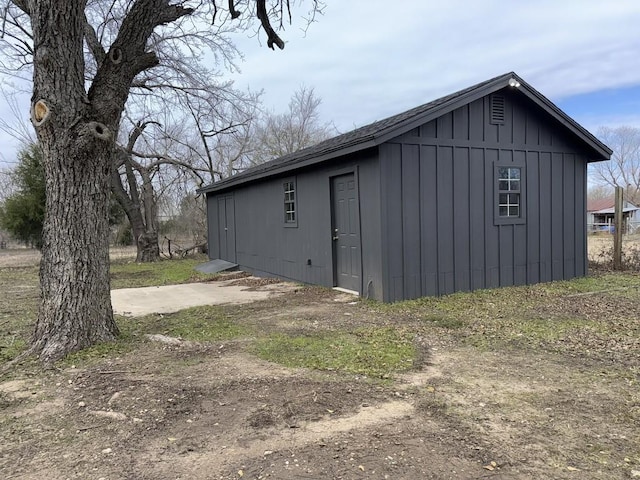 view of home's exterior featuring an outdoor structure