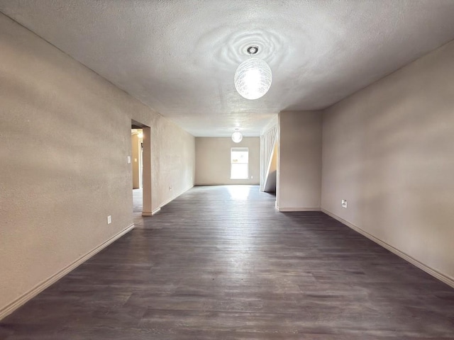 empty room featuring a textured ceiling