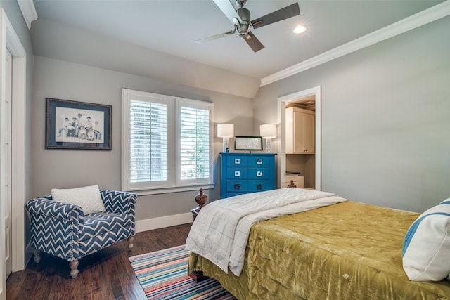 bedroom with ceiling fan, dark hardwood / wood-style floors, and ornamental molding