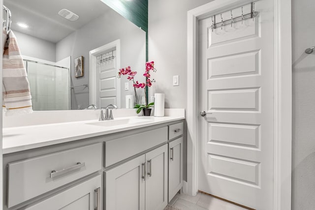 bathroom featuring vanity and walk in shower