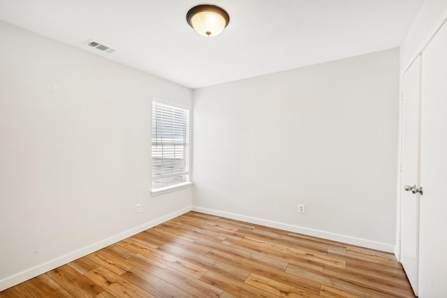 empty room featuring light hardwood / wood-style floors