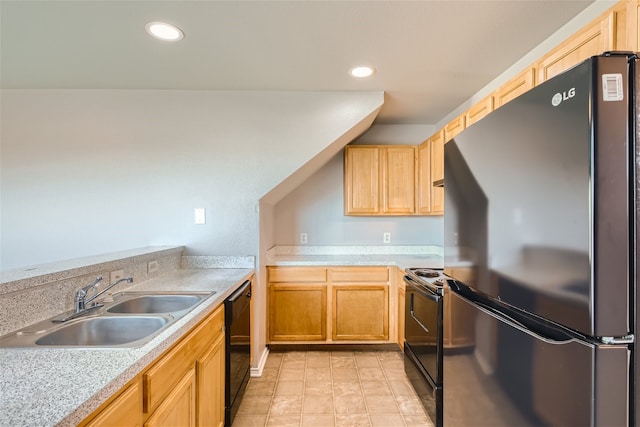 kitchen with light brown cabinetry, sink, and black appliances