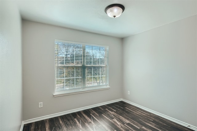 empty room featuring dark hardwood / wood-style floors