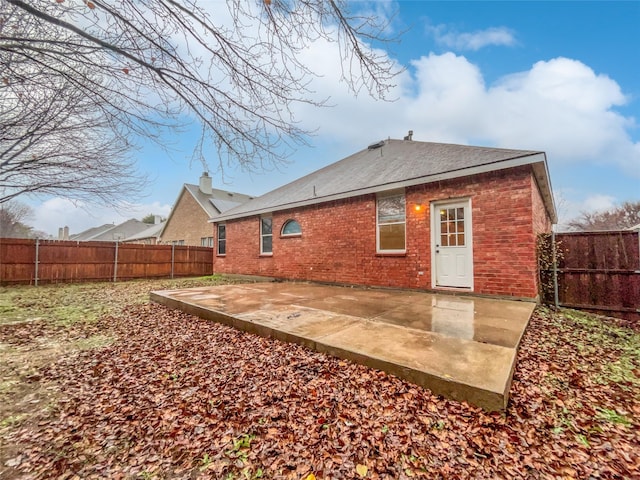 rear view of house with a patio area