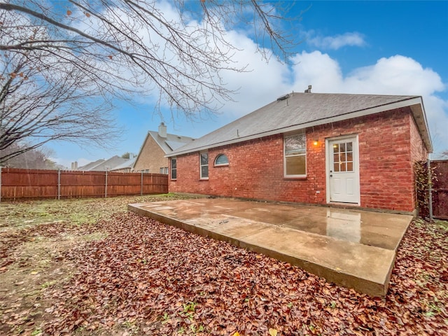 rear view of property with a patio area