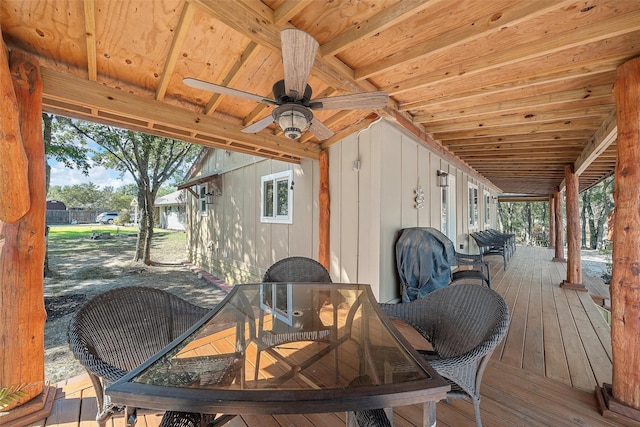 wooden deck featuring ceiling fan