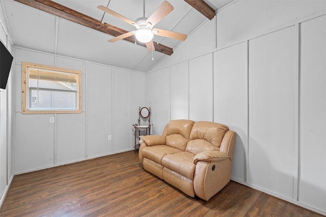 living area with ceiling fan, dark hardwood / wood-style flooring, and lofted ceiling with beams