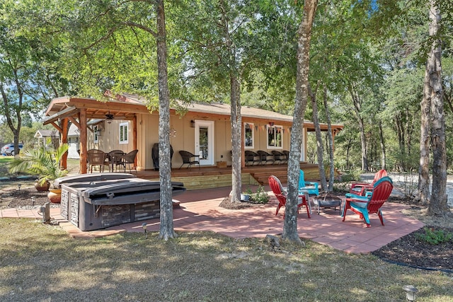 exterior space featuring a fire pit and a patio