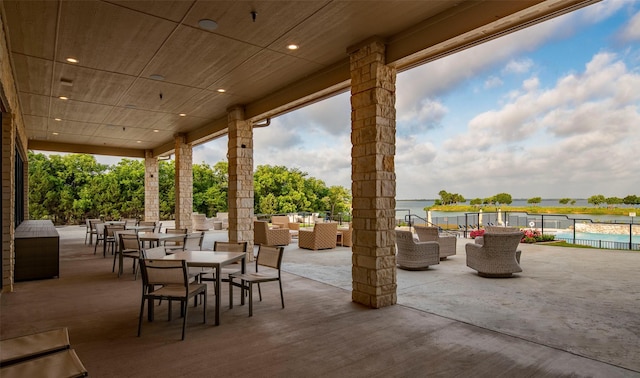 view of patio / terrace featuring an outdoor living space and a water view