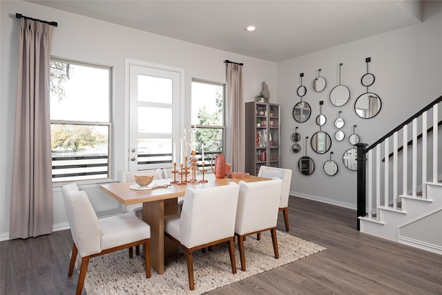 dining space featuring dark hardwood / wood-style floors