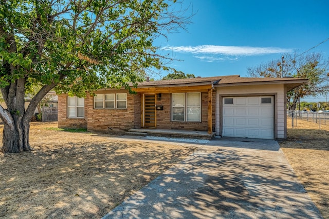 ranch-style house featuring a garage