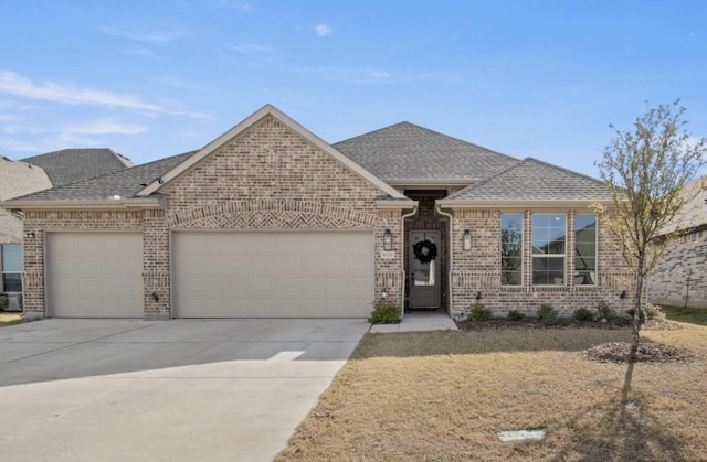 view of front of property with a garage