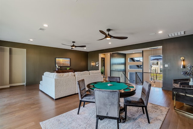 playroom featuring hardwood / wood-style floors and ceiling fan