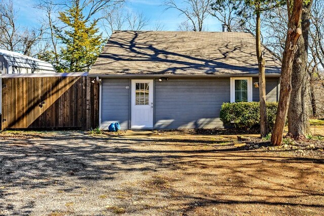 view of side of property with a sunroom