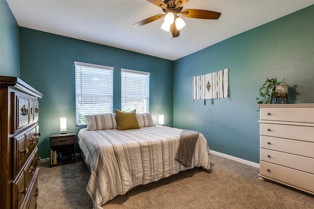 bedroom with ceiling fan and carpet floors