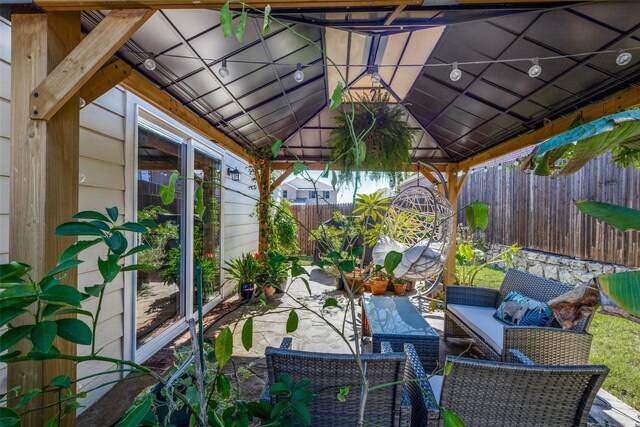 view of patio / terrace with outdoor lounge area and a gazebo