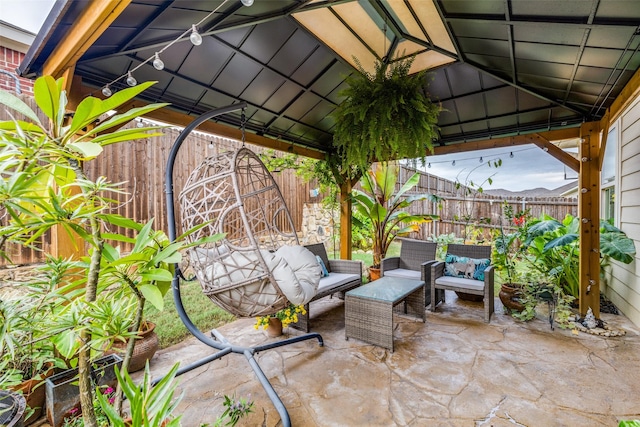 view of patio / terrace with a gazebo and an outdoor living space