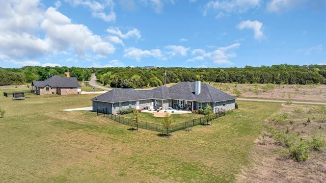 aerial view featuring a forest view