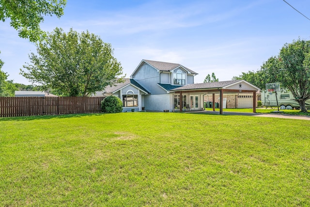 view of front facade featuring a garage and a front yard