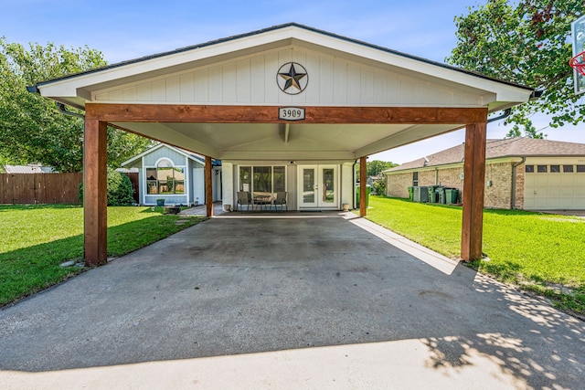 view of front of property featuring french doors and a front yard