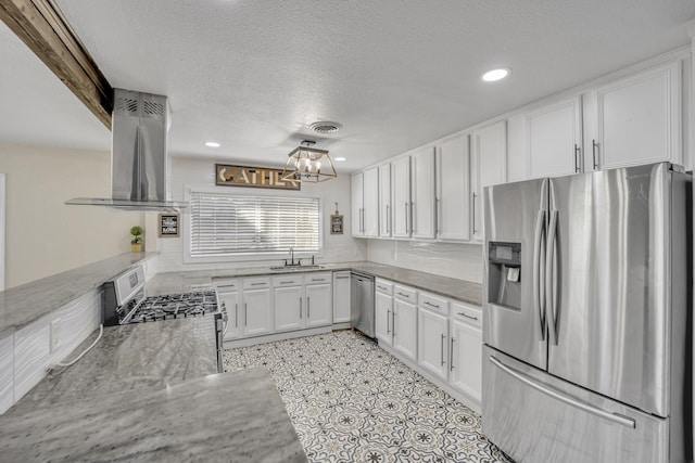 kitchen featuring white cabinetry, sink, light stone counters, extractor fan, and appliances with stainless steel finishes