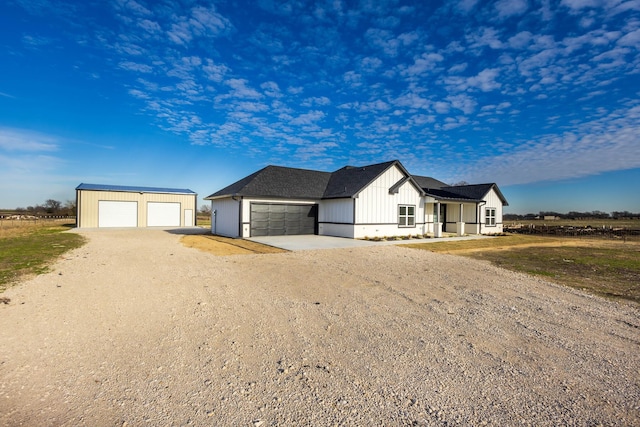 view of front of property featuring an outbuilding