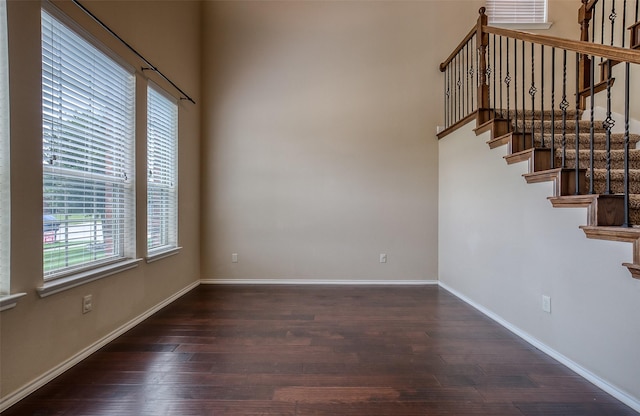 interior space with dark hardwood / wood-style flooring