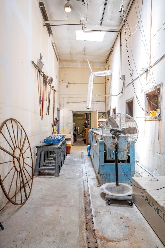 corridor with concrete flooring