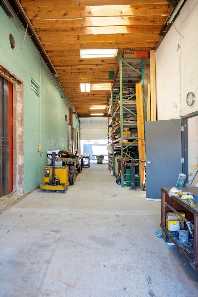 garage featuring wooden ceiling