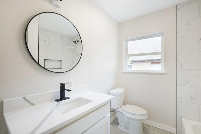 full bathroom featuring vanity, toilet, and tiled shower / bath