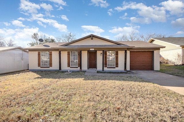 ranch-style house with a garage and a front yard