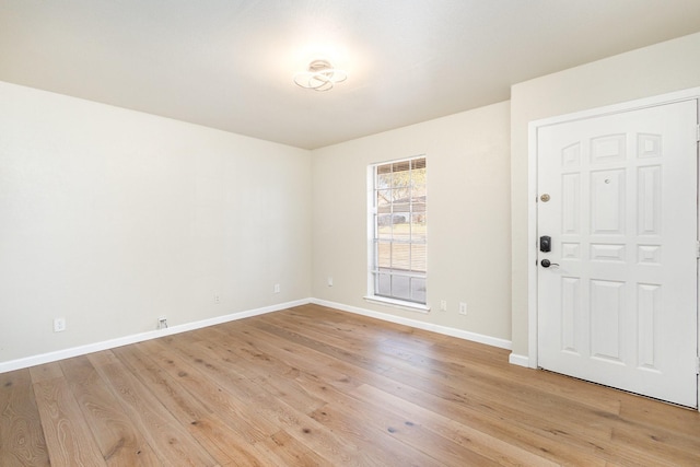 entrance foyer featuring light wood-type flooring