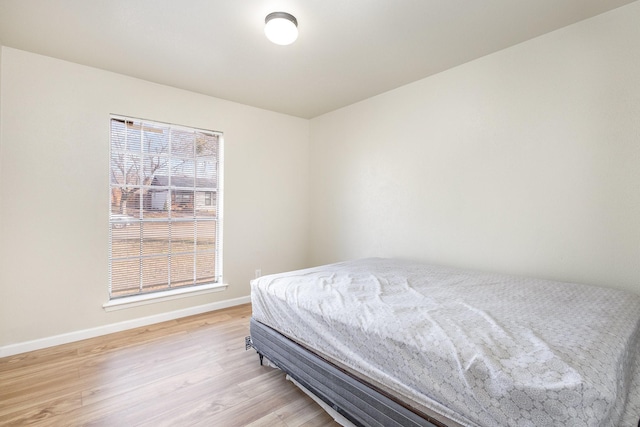 bedroom featuring light wood-type flooring