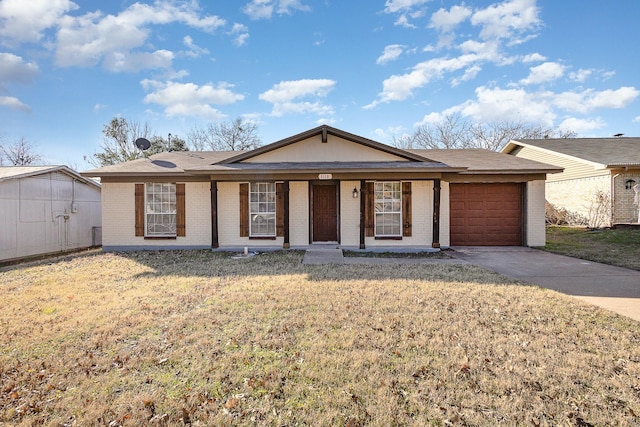 ranch-style house featuring a garage and a front yard