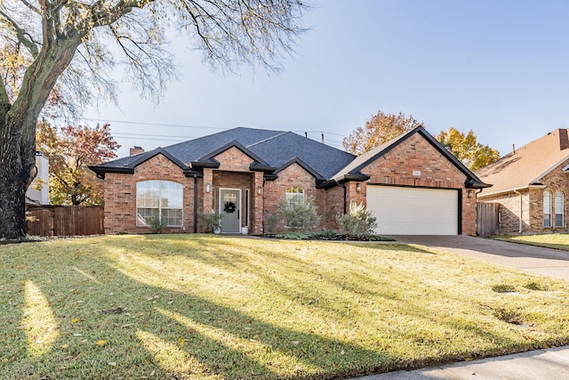 view of front facade featuring a garage and a front lawn