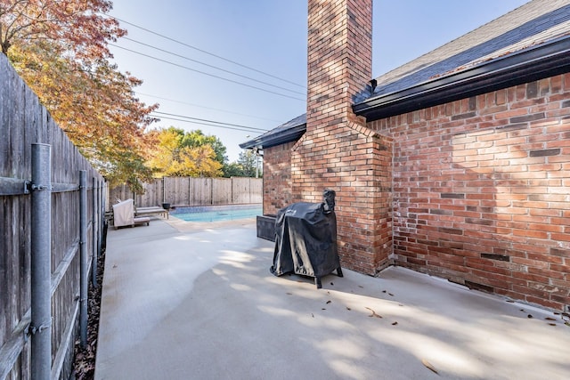 view of patio / terrace featuring a grill