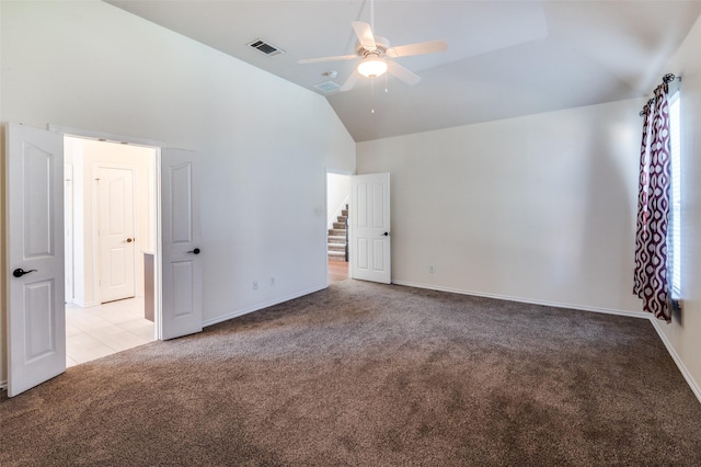 interior space with ceiling fan and high vaulted ceiling