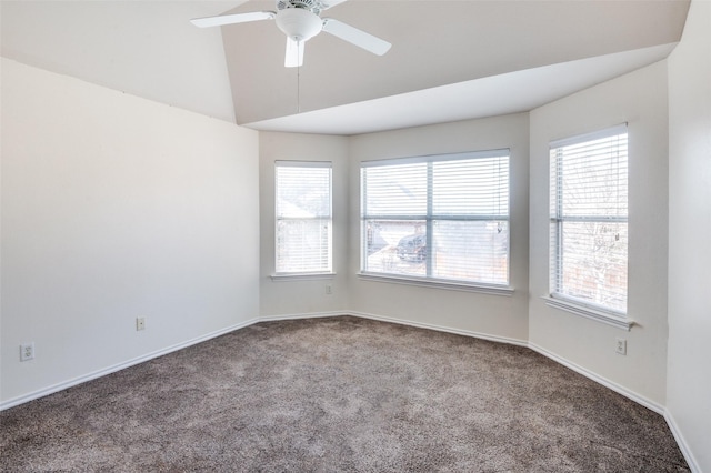 unfurnished room featuring carpet flooring, ceiling fan, and vaulted ceiling