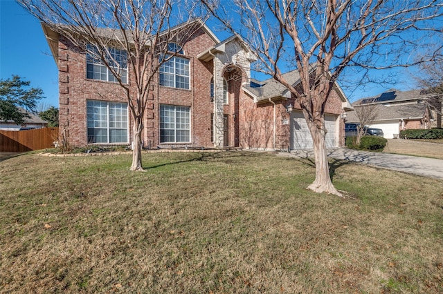 front of property featuring a front lawn and a garage